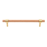 "Light wood and brass pull bar with cylindrical design, isolated on a white background."