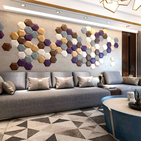 Uayal Wall Panel - Stylish, Noise-Reducing Geometric Design in multicolor hexagons decorates a modern living room wall above a grey sectional sofa.