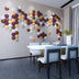 Uayal Wall Panel - Stylish, Noise-Reducing Geometric Design forms a world map pattern in a dining room with white chairs and a modern table.