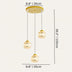Gold and cream woven sphere three-light pendant chandelier with adjustable hanging wires against a neutral background.