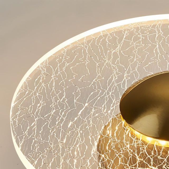 "A close-up view of a ceiling light with a cracked-glass effect diffuser, highlighting the intricate pattern and soft illumination."