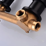 Close-up of brass plumbing components for Vartay Bathroom Faucet in matte black finish, highlighting build quality.