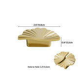 "A gold brass drawer pull with a fan-shaped design, shown from the front and at an angle."