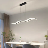 "A modern LED pendant light with an undulating wave design, illuminating an oval dining table with chairs and plants."