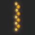 Ten warm gold circular wall lamps with ribbed metal frames arranged vertically on a dark background.