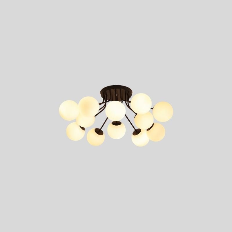 "An 11-light ceiling light with spherical glass shades and a black iron frame."