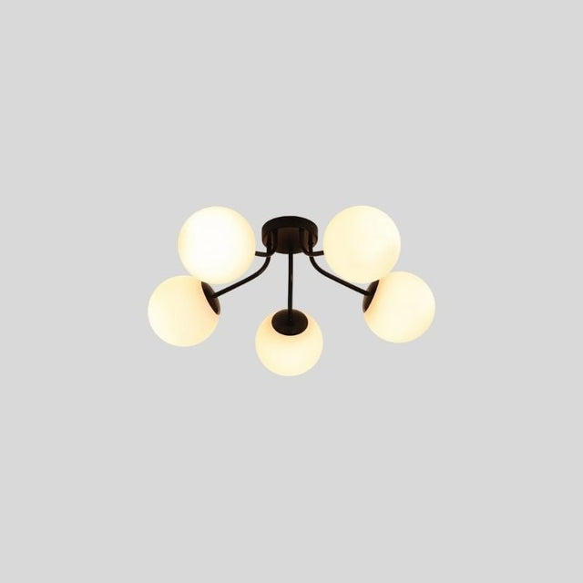 "A 5-light ceiling light with spherical glass shades and a black iron frame."