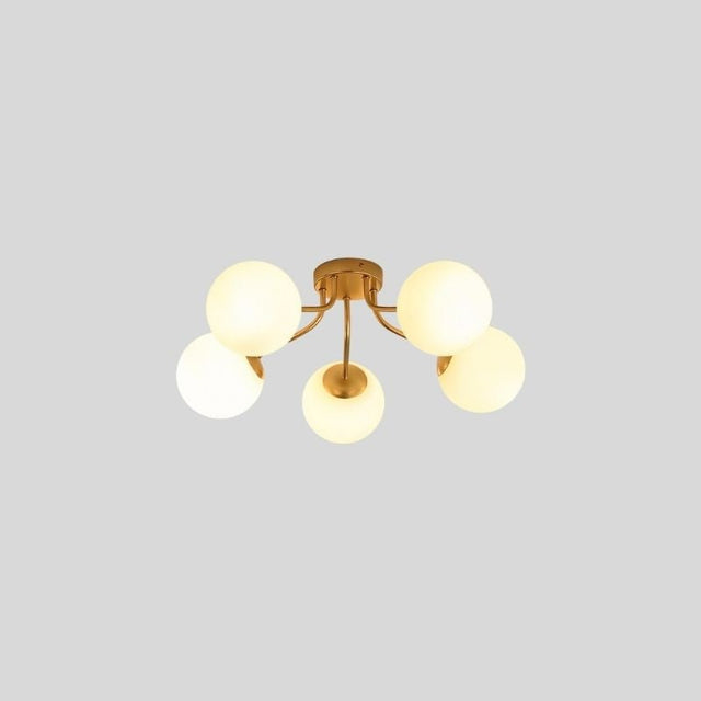 "A 5-light ceiling light with spherical glass shades and a gold iron frame."