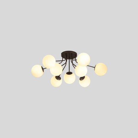 "A 9-light ceiling light with spherical glass shades and a black iron frame."