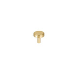"A gold faceted brass knob with a diamond-cut texture, isolated on a white background."