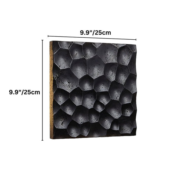 "Black travertine wall lamp with hexagonal pattern, showing dimensions of 9.9 inches or 25 centimeters on a white background."
