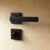 Modern stainless steel mortise lock shown front and side view with dimensions on white background.