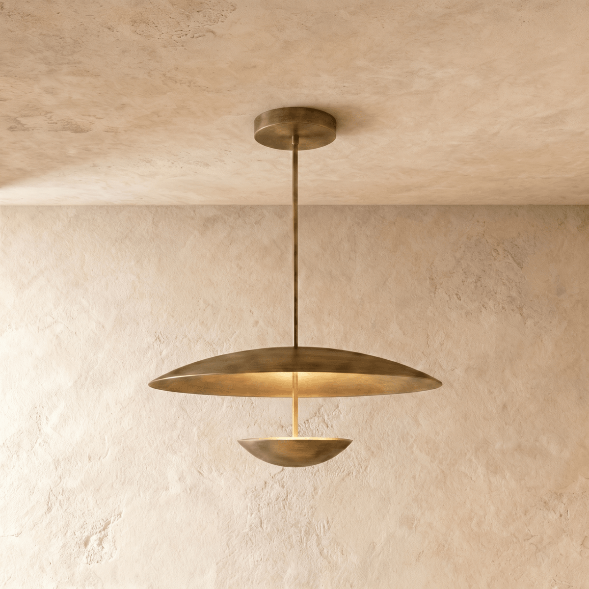 Modern pendant light fixture with tiered disc shades and metal pipe, shown against white background.