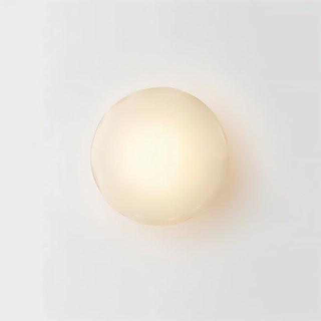 "Round replacement glass shade for a modern wall lamp."