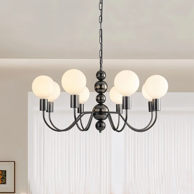 "Walfi chandelier with iron frame and frosted glass globes, isolated on a light background."