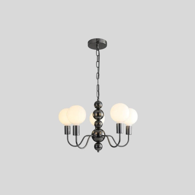 "Modern sculptural chandelier with a black iron frame, multiple curved arms, and frosted glass globes providing soft ambient lighting."