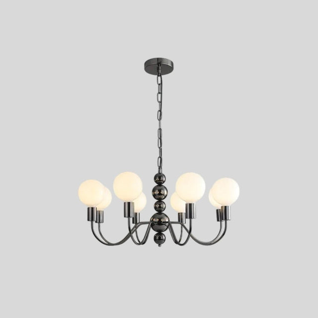 "Modern sculptural chandelier with a black iron frame, six curved arms, and frosted glass globes, providing soft ambient lighting."