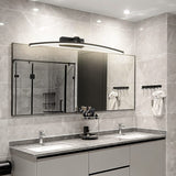 "A modern, curved LED wall lamp illuminating a bathroom vanity with a double sink and mirror."