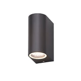 "Angled view of a modern outdoor wall lamp with a dark aluminum body and glass diffuser, showing its compact design."