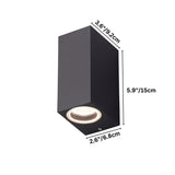 "Vertical dimensions of a modern cubic outdoor wall lamp with a dark aluminum body and glass diffuser: 5.9 inches in height, 3.6 inches in width, and 2.6 inches in depth."