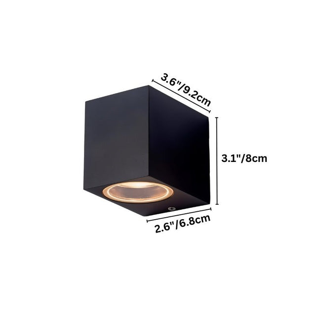 "Dimensions of a modern cubic outdoor wall lamp with a dark aluminum body and glass diffuser: 3.6 inches in width, 3.1 inches in height, and 2.6 inches in depth."