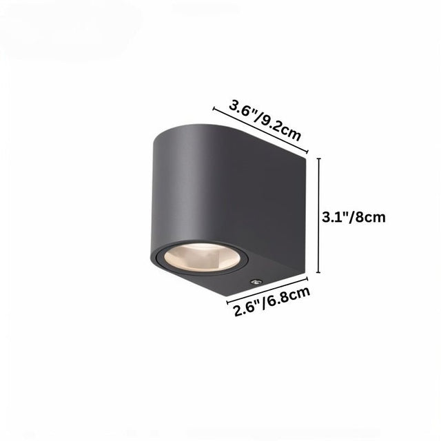 "Dimensions of a modern outdoor wall lamp with a dark aluminum body and glass diffuser: 3.6 inches in width, 3.1 inches in height, and 2.6 inches in depth."