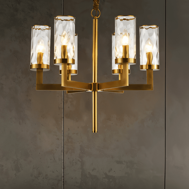 Wynlo Chandelier – compact copper light fixture with six glass shades, ideal for bedrooms or smaller modern interiors.