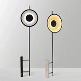 "A set of two halo floor lamps with different light colors, showcasing their sculptural designs and modern aesthetics."
