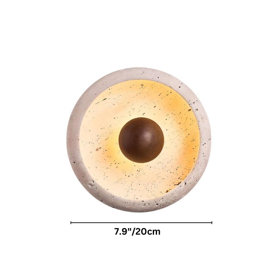 "Dimensions of a minimalist, circular travertine wall lamp with a warm wooden centerpiece, suitable for contemporary or rustic interiors."
