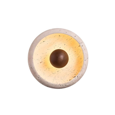 "Front view of a minimalist, circular travertine wall lamp with a warm wooden centerpiece, showcasing its blend of organic and modern design."