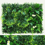 Yasna Greenery Panel with palm-like leaves and white flowers, creating a lifelike, UV-resistant indoor green wall aesthetic.
