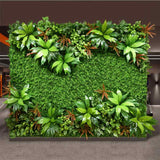 Freestanding Yasna Greenery Panel with lush artificial leaves and tropical accents, ideal for indoor green wall installations in commercial spaces.