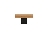 "A minimalist wood and black knob, combining natural finishes with modern design, isolated on a white background."