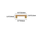"Dimensions of a minimalist wood and brass pull bar for contemporary furniture."
