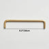 Gold-finished metal pull bar with rounded handles, measuring 6.3 inches, displayed against a white background.