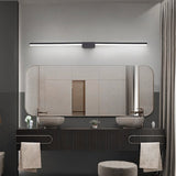 "Sleek black Zanal wall lamp illuminating a modern bathroom vanity with dual sinks and a large mirror."