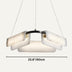 Modern pendant chandelier with white alabaster curved shades and brushed metal accents suspended on grey cords.