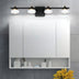 Modern bathroom vanity with mirror cabinet and four-light brass vanity fixture