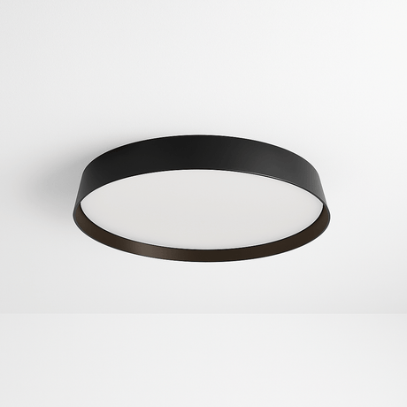 Zena Ceiling Lamp in black with flush-mounted minimalist design, ideal for modern interiors and ambient lighting in living or office spaces.