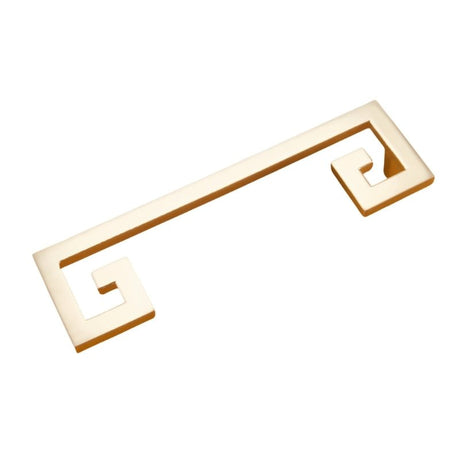 "A brushed gold, geometric pull bar with bold cutouts made of zinc alloy, isolated on a white background."