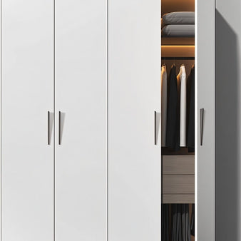 "Sleek, tapered zinc alloy pull bars with a geometric profile in a dark finish on a modern white wardrobe."