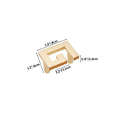 "A brushed gold, geometric knob with sharp, angular edges, made of zinc alloy, shown with dimensions."