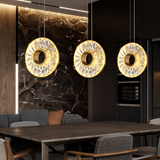 Zunel Pendant Light – Copper & Crystal Elegance set of three over a wooden dining table, blending with a marble-accented modern kitchen.