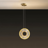 Zunel Pendant Light – Copper & Crystal Elegance single pendant against a dark background, showcasing its halo design and warm glow.