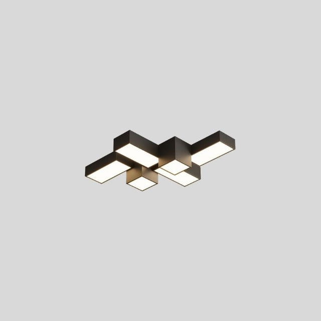"A multi-piece geometric ceiling light with interlocking rectangular forms, isolated against a neutral background, showcasing its modern design."
