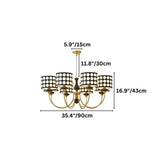 "A six-light chandelier with black polka dot shades and a brass frame is displayed on a white background with size dimensions overlaid."