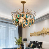 "An agate chandelier with an intricate iron frame in a luxurious interior design setting."