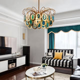 "An agate chandelier with an intricate iron frame in a living room setting."