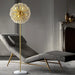 Let the Aetherios Floor Lamp cast a warm glow in any room