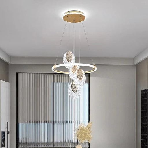 Illuminate any room with the radiant charm of the Aetheris Round Chandelier.